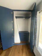 Stranged shaped alcove utilised with drawers, hanging and a shelf, fitted in Stokesley
